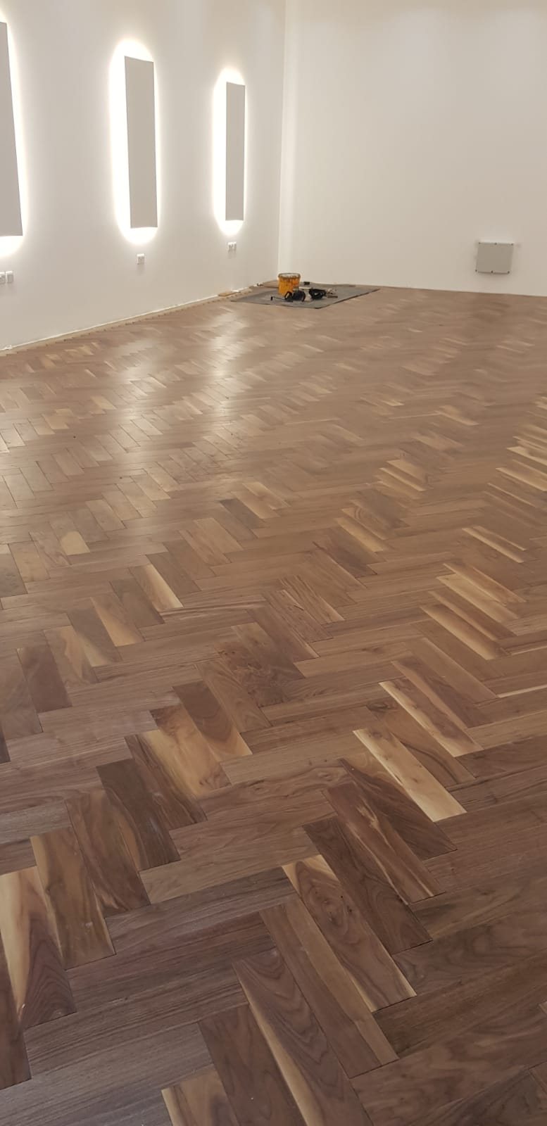 Herringbone parquet floor laid by Thomas Joinery Services in a Bedford living room