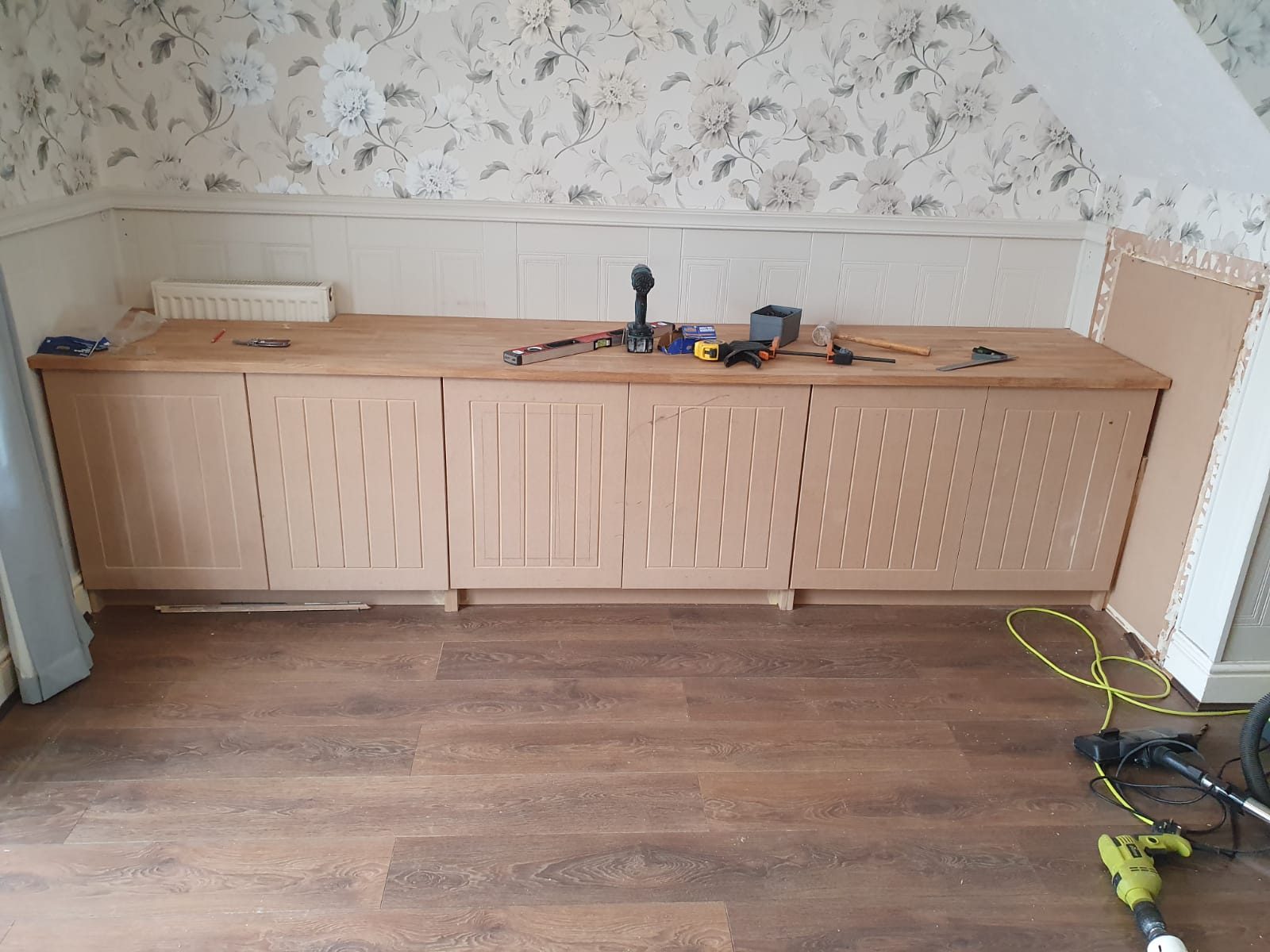 Panelled TV unit with shelving alongside, Thomas Joinery Services, Bedford