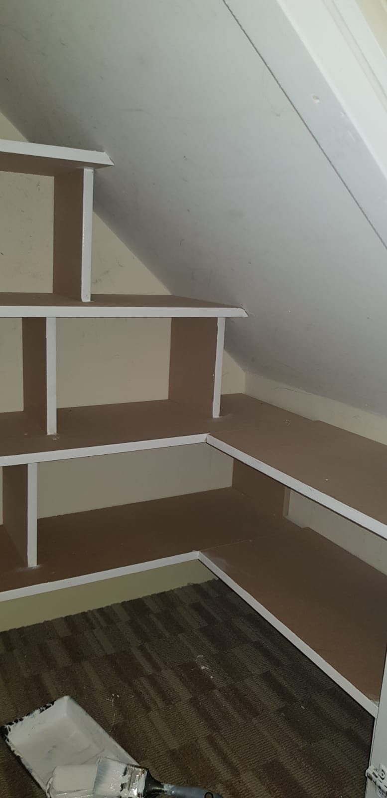 Stepped shelving following the stringer, Thomas Joinery Services, Bedford