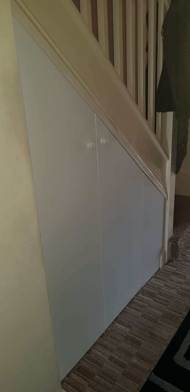 Cupboards and shelving under a staircase, Thomas Joinery Services, Bedford