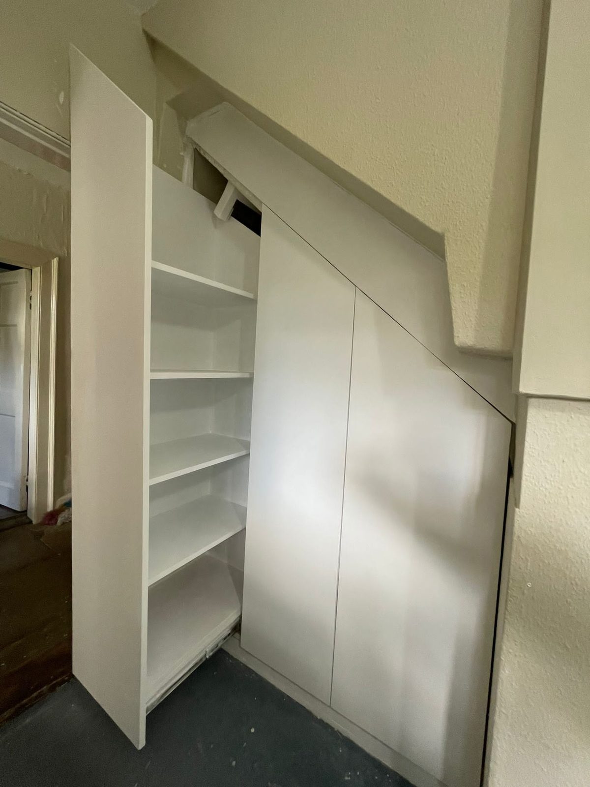 Under-stairs cupboard with full height doors, Thomas Joinery Services project work near High Street, Wilstead MK45